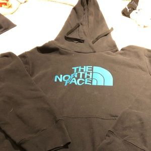 The Northface black hoodie with teal print.